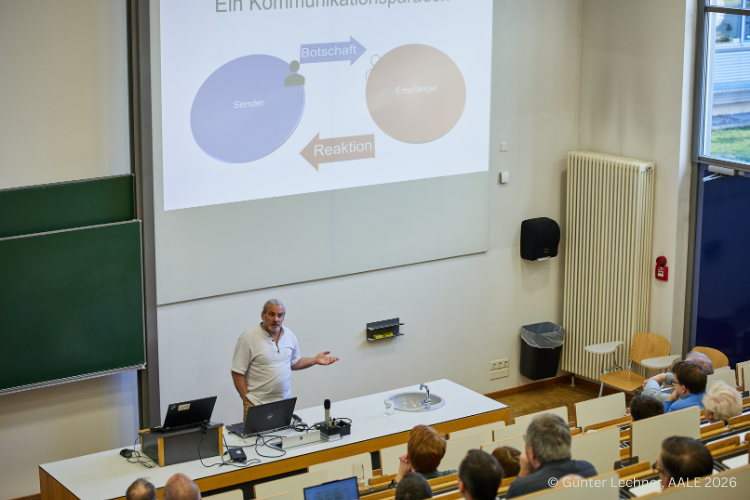 Michael Grampp from esmo automation speaking to a professional audience at AALE 2026 about software, communication and company culture.