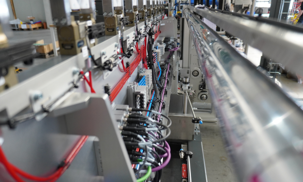 Automated production line with wiring, control technology and machine modules